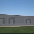 Modern Industrial Factory Building With Glass Curtain Walls Metal Roof And Green Surroundings