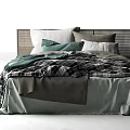 Modern Double Bed with Wicker Headboard Plaid Quilt and Green Gray Pillows