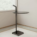 Modern Black Side Table With Round Top And Metal Stand By Window Corner 3d model