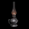 Vintage Decorative Candle Lamp Featuring Glass Shade and Lit Flame on Metal Base
