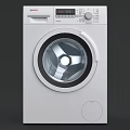 White Washing Machine With Woven Laundry Basket And White Towel In Home Laundry Room