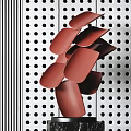 Modern Red Irregular Sheet Like Sculpture Mounted On Dotted And Striped Background Panel 3d model