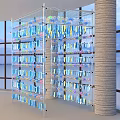 Hanging Art Installation With Colorful Transparent Bubbles Paper Strips Large Windows And Blue Sky