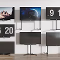 Multiple TVs With Various Sizes Different Stands And Display Content