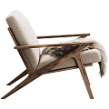 Modern Stylish Wooden Frame Armchair With Light Gray Cushion And Furry Blanket