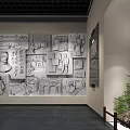 Indoor Cultural Exhibition Wall With Black White Drawings Texts Circular Sign And Green Plant