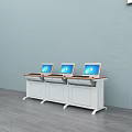 Office Work Desks With Wooden Tops White Cabinets And Laptops Against Light Blue Wall