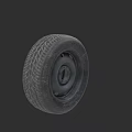 Black Car Tire With Tread Pattern And Metal Rim On Dark Background