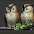 Two Ceramic Owl Figurines With Brown Feathers And Green Leaf Decor