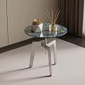 Round Marble Top Side Table With Silver Metal Frame On Carpet And Curtain Background