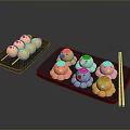 Colorful Animal Shaped Snacks Including Chicken and Octopus on Black Trays with Chopsticks