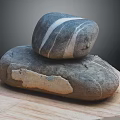 Natural Wooden Board With Stacked Smooth Stone Rocks And Natural Textured Surface