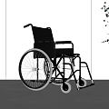 Modern Black Medical Wheelchair With Silver Wheels Armrests And Comfortable Seating
