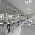 Commercial Kitchen Design With Stainless Steel Worktables Ventilation System Storage Cabinets And Non Slip Flooring