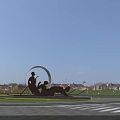Municipal Road With Street Lamps Vehicles Greenery Crosswalk And Lake View