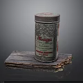 Vintage Tea Tin With Label Placed On Rustic Wooden Board Surface