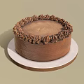 Round Brown Cake With Cream Decorative Border On White Plate 3d model