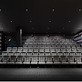 Modern Cinema Interior Design With Rows Of Comfortable Seats And Stylish Lighting