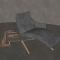 Modern Gray Lounge Chair With Side Table Books And Soft Blanket In Minimalist Interior