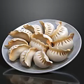 Steamed White Dumplings With Pleated Edges Arranged On A Ceramic Plate