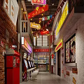 Retro Street Scene Featuring Neon Signs Vintage Arcade Machines And Brick Walls