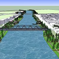 Municipal Road Truss Bridge Over River With Surrounding Buildings And Greenery
