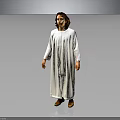 A Man Wearing Full Length White Robe Standing Against Gray Background