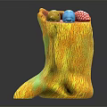 Yellow Textured Boot Shaped Container Holding Colorful Balls Yellow Blue And Polka Dot