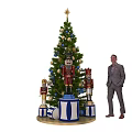 Festive Christmas Tree With Star Blue Gold Ornaments Gift Boxes And Man In Suit