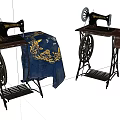 Vintage Industrial Sewing Machines With Iron Framed Tables And Embroidered Fabric