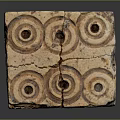 Hand Carved Cube Shaped Sculpture With Intricate Circular Holes And Textured Surface