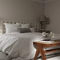 Modern Bedroom Interior With Upholstered Headboard Nightstands Table Lamps And Wooden Bench