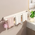 Wall Mounted Bathroom Accessories With Towel Rack Colorful Towels And Green Plant