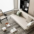 Beige Sofa Set with Green Beige Cushions on Black White Geometric Rug and Rattan Chair