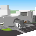Modern Cultural Center Building With Geometric Design In Urban Area And Green Space