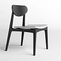 Modern Dining Chair With Black Frame Curved Backrest And Light Colored Seat