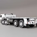 White Heavy Duty Multi Wheeled Truck With Large Tires And Flatbed Utility Design