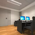 Casual Lounge Area With Wooden Floor Gray Walls Desks Computer Monitors Black Chairs And Sofa