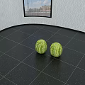 Two Fresh Green Striped Watermelons On Black Tiled Surface With Leaf Pattern Wall