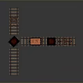 Detailed miniature model train track with orange and black carriages on metal rails
