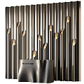 Modern Store Reception Desk Featuring Metallic Finish Sign Against Vertical Metallic Strips And Golden Lights