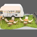 Camping Caravan Setup With Car Outdoor Tables Chairs Awning And Wave Signboards On Grass