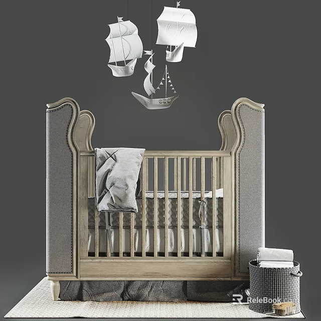 Elegant Baby Crib with Wooden Railings Upholstered Headboard and Ship Shaped Mobile 3d model 