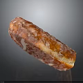 Appetizing Cured Salami Slice with Red and White Marbled Texture and Glistening Surface