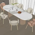 Modern Round White Dining Table Set with Beige Brown Chairs Golden Legs Vase Fruit Bowl