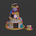 Layered Celebration Cake Decorated With Purple Blue Pink Flowers And Golden Details With Small Cake