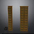 Tall Brown Wooden Drawer Cabinets With Multiple Drawers And Small Metal Chest