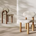 Modern Dining Chairs With Zebra Pattern And Cream Colored Seat And Wooden Legs