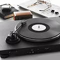 Vintage Audio Equipment Setup With Turntable Radio Open Newspaper Eyeglasses Notebook And Pen