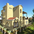 Detached Villa With Yellow Exterior Red Roof Terrace Pergola Greenery Courtyard And Tables Chairs